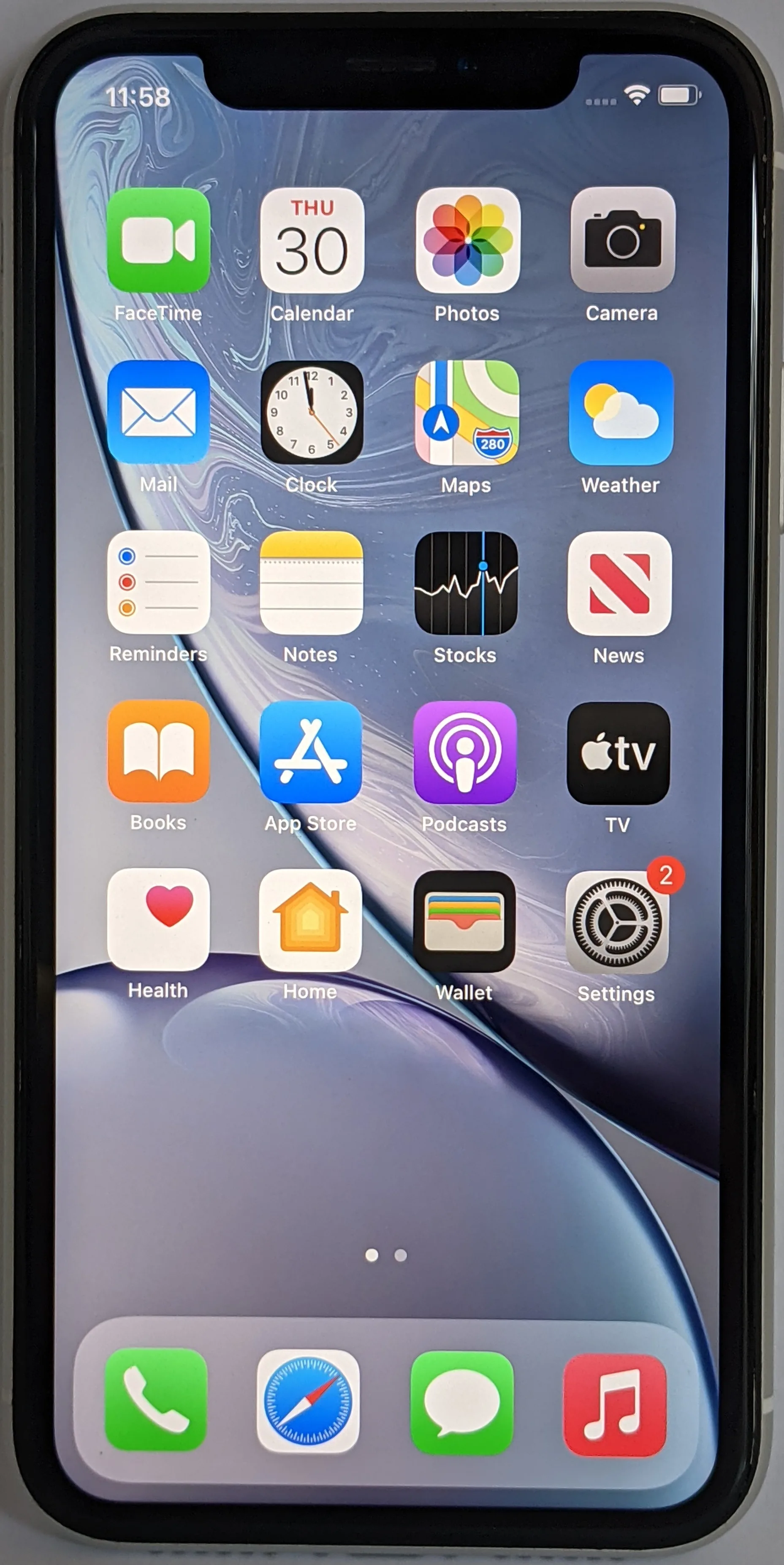 iPhone XR display in the hand