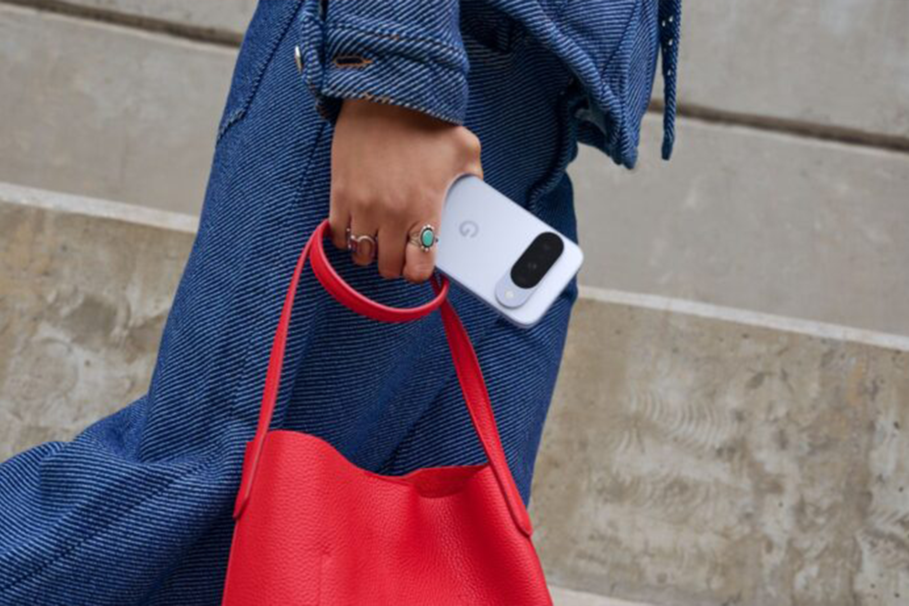 Google Pixel 10 in hand
