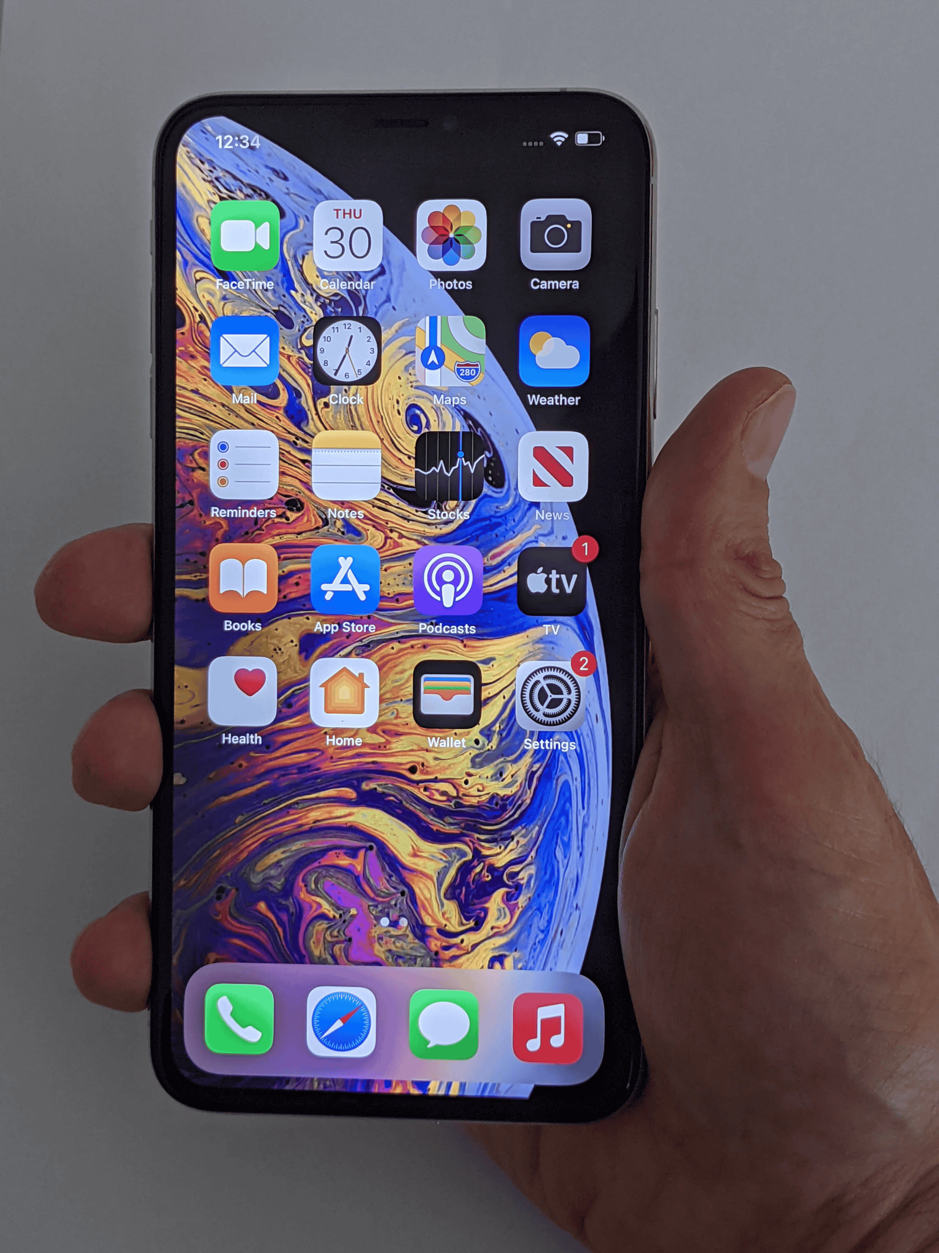 iPhone XS Max in the hand