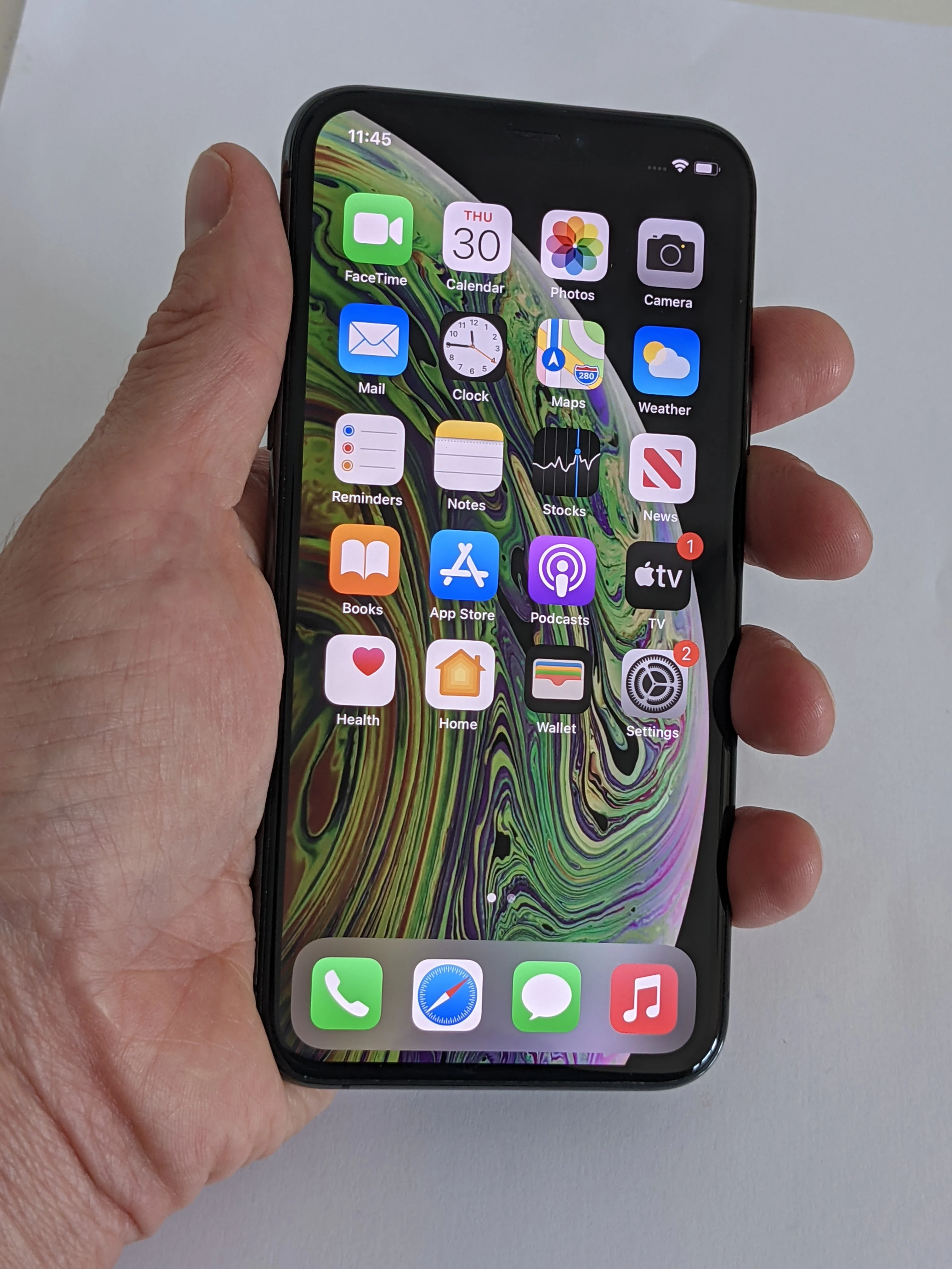 iPhone XS in the hand